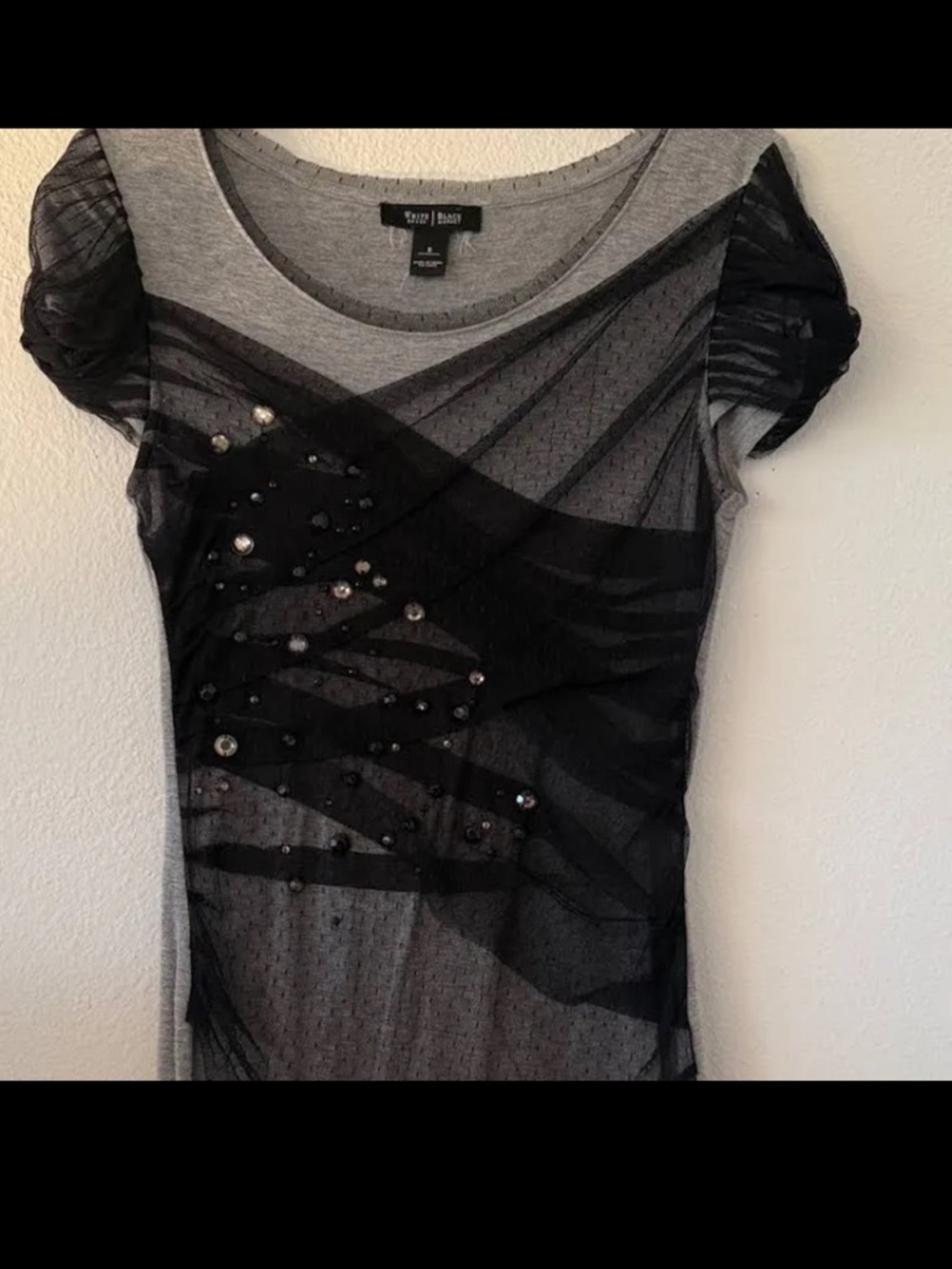 White House black market gray top with black sparkly sheer overlay